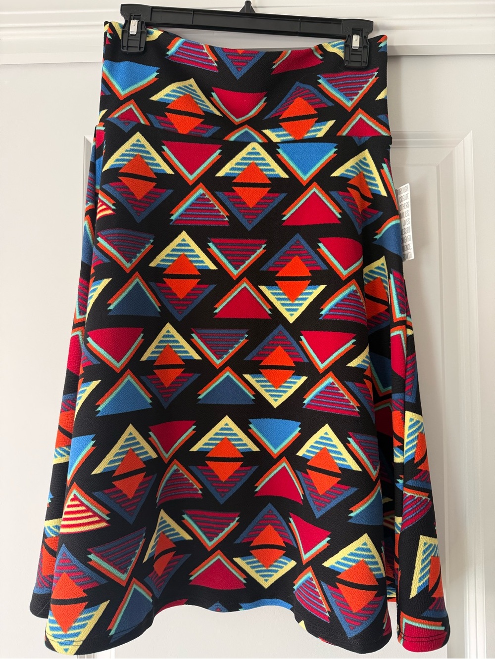 LuLaRoe Black Skater Skirt with Red, Blue, Yellow & Orange Geometric Print